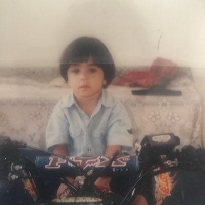fparson as a kid on a bike